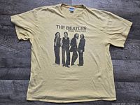 Front view of T-shirt laid flat showing full graphic and color