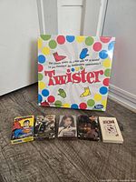Twister box and five card decks front view