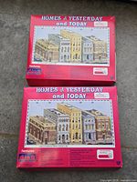 Two red Life-Like Homes of Yesterday and Today model kit boxes: First National Bank and Legal & Professional Offices