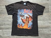 Full front view of T-shirt laid flat