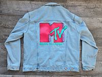Back view of denim jacket showing full MTV Music Television graphic