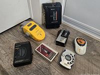 Group shot of all seven portable audio items