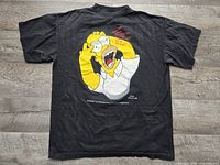 Full back view of black Homer Simpson graphic T-shirt