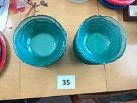 Top view of two bowls and stacked set showing color and size