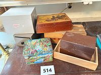 Group shot of all seven boxes showing relative sizes and materials