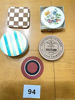 Group view of all ten assorted coasters on table