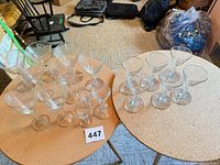 All stemware sets on two tables showing quantity and styles