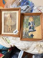 Both framed prints side by side showing overall condition and frame style