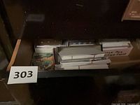 Drawer containing several stacks of greeting card sets