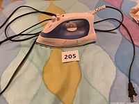 Full view of iron with cord