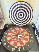 Side-by-side view of both dartboards