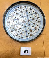 Top view showing full lattice flower design and rim