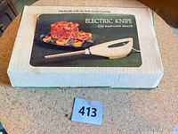 closed box top showing product photo and branding