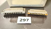 Two Hohner harmonicas side by side displaying overall appearance