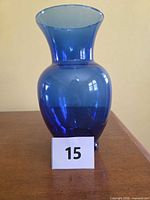 Front view of cobalt blue flared glass vase