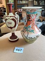 Two vases on tabletop, showing overall forms and relative sizes