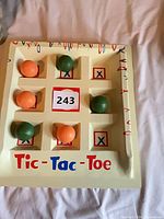 overview of game board with six balls placed in grid