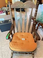 Front view of rocking chair with cushion