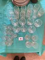 Overhead view of all glass sets on table