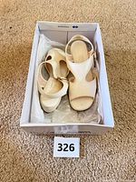 Pair of cream Softspots slingback sandals in box