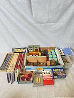 Overall view of all boxed and loose candles and Parowax block