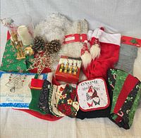 overview of all Christmas decor items on cloth backdrop