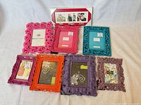 All eight colourful frames laid out together