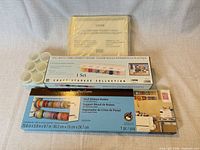 Front view of all boxed and sealed craft storage items