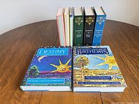 All books front covers visible on table