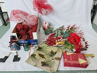 Overview of entire lot: floral stems, bows, figurines, wire tree, filler, gift boxes