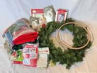 Overview of entire lot including wreaths, frames, kits, fabric