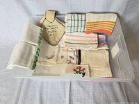 Full lot of assorted linens in tote