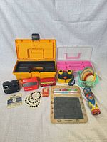 Group shot showing entire assortment including viewers, cameras, toolbox, chalkboard, storage boxes and accessories