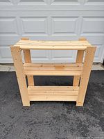 Front view of pine wood 3-shelf unit