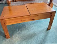 Front view of pine storage bench, lid closed