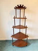 full view of five-tier corner shelf front