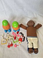 Group shot of two Potato Head bodies, soft doll, and accessories