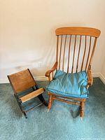 Front view of Windsor rocking chair with teal cushion and matching rocking footstool