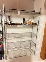 Front view of chrome wire shelving with five shelves