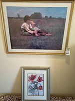 Overall view of both framed prints showing subjects and frames