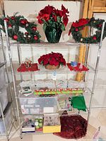 Full shelving unit with majority of holiday items visible
