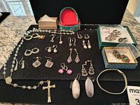Overview of all jewelry pieces laid out on display board