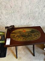 Top view showing printed hunting scene and overall tabletop