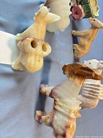 Group of onyx animal figurines showing variety