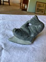 Front angled view of soapstone seal sculpture