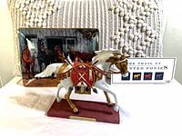 Full lot showing Painted Ponies figurine, Wild Wings plate, info card