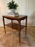 Angled view showing full table with top, shelf and legs