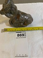 Angled view with tape measure showing length