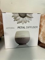Front of boxed doTERRA Petal Diffuser