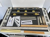 Overview of all measuring tools laid out on table